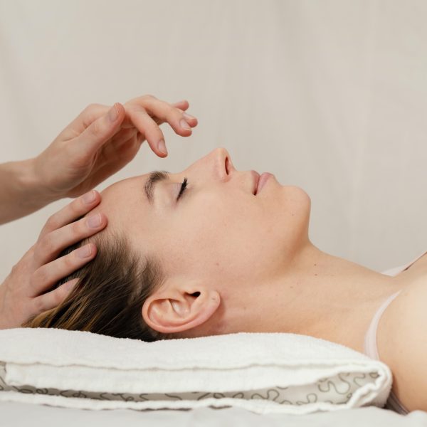 close-up-therapist-massaging-patient-s-head